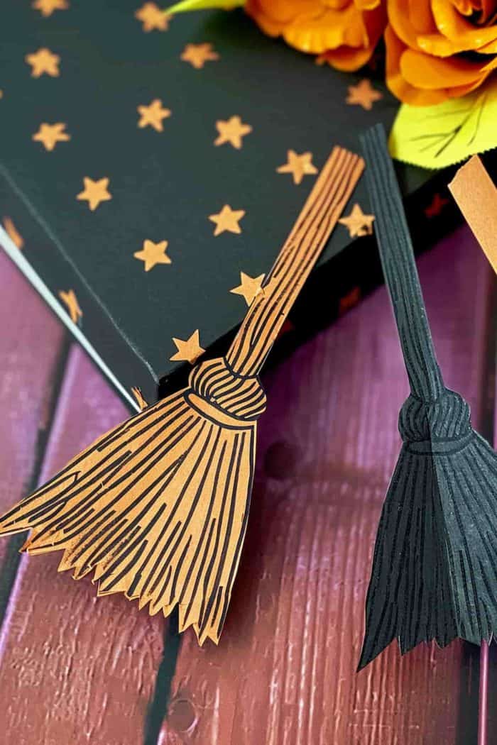 These witch’s broom bookmarks are made from black and brown construction paper and embellished with tiny star stickers. 