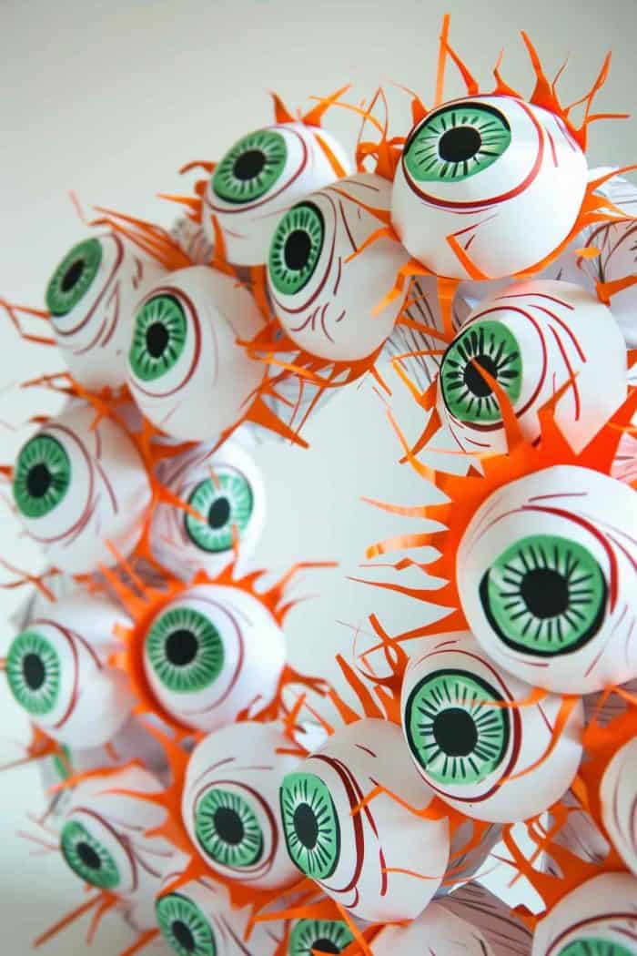 The veins — drawn on with red markers — make them look even more unsettling, along with the eyes made from white construction paper folded into cups for a 3D effect. 