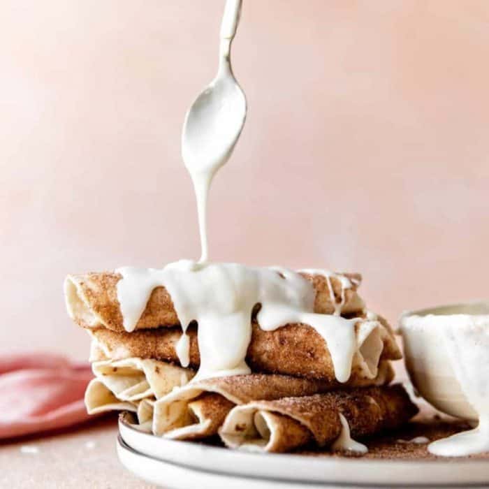Soft, warm buttered tortillas are dusted with cinnamon sugar and rolled up in this recipe, giving you an easy-to-make yet ultra-satisfying dessert.