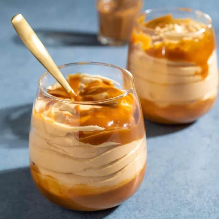 Dulce de leche mousse is a creamy, eggless dessert that's all about the rich and velvety texture of caramelized milk.