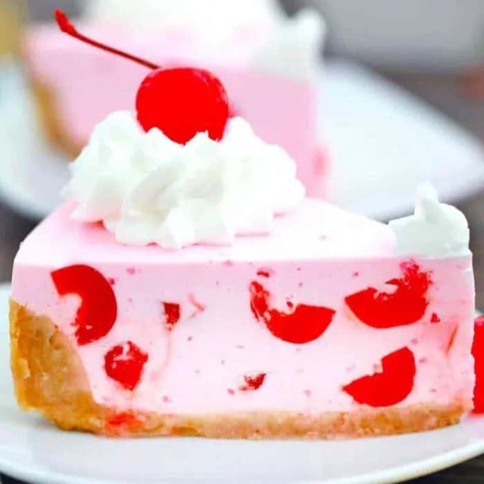 the cherry filling — created with Jell-O, Cool Whip, and mascarpone — takes center stage, nestled in a gorgeous crust