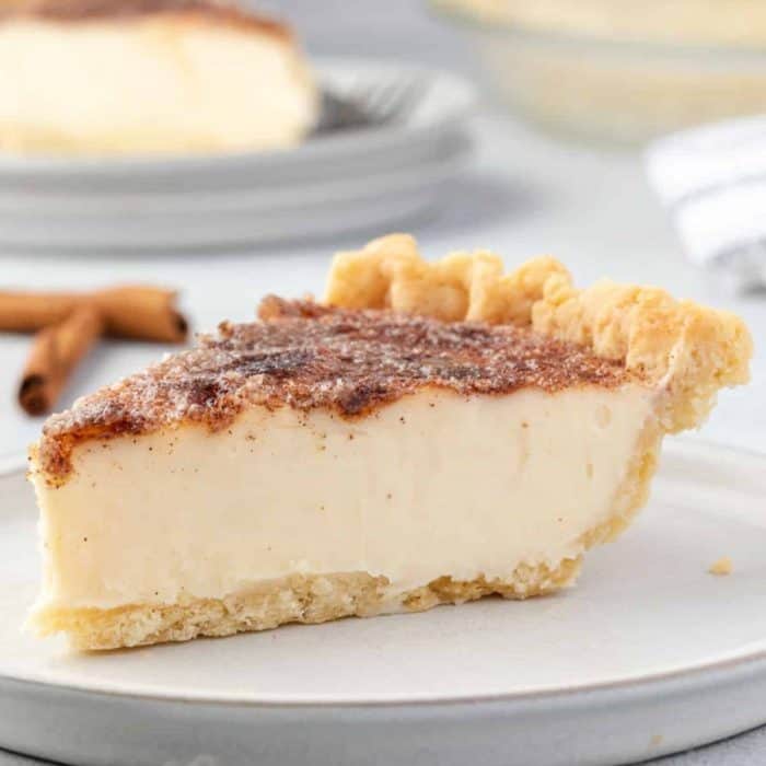 Also known as Hoosier pie, this sugar cream pie is a classic American dessert that gives you a silky, eggless custard filling with a caramelized sugar topping and a flaky pie crust.