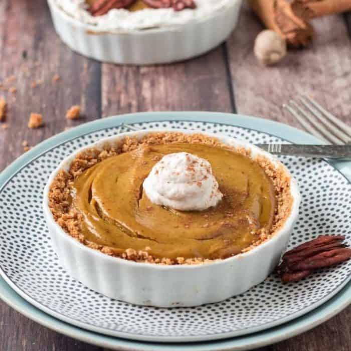 this eggless version is a creamy, spiced slice of heaven with a velvety pumpkin filling that's perfectly complemented by a browned cookie crust.