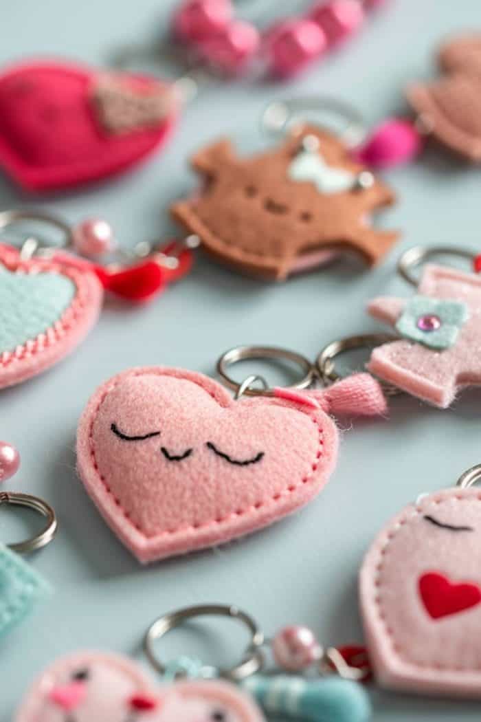 Design personalized felt keychains by cutting felt into shapes such as hearts and then adding embroidered details or monograms. 
