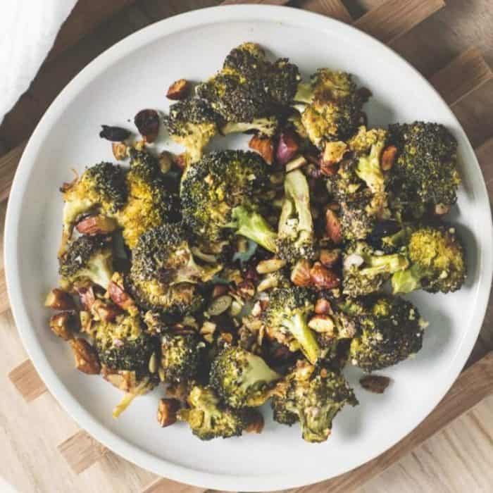 Affectionately dubbed “broccoli crack,” this dish treats your taste buds to a texture-rich experience with crispy broccoli florets, toasted almonds, and plump pumpkin seeds.