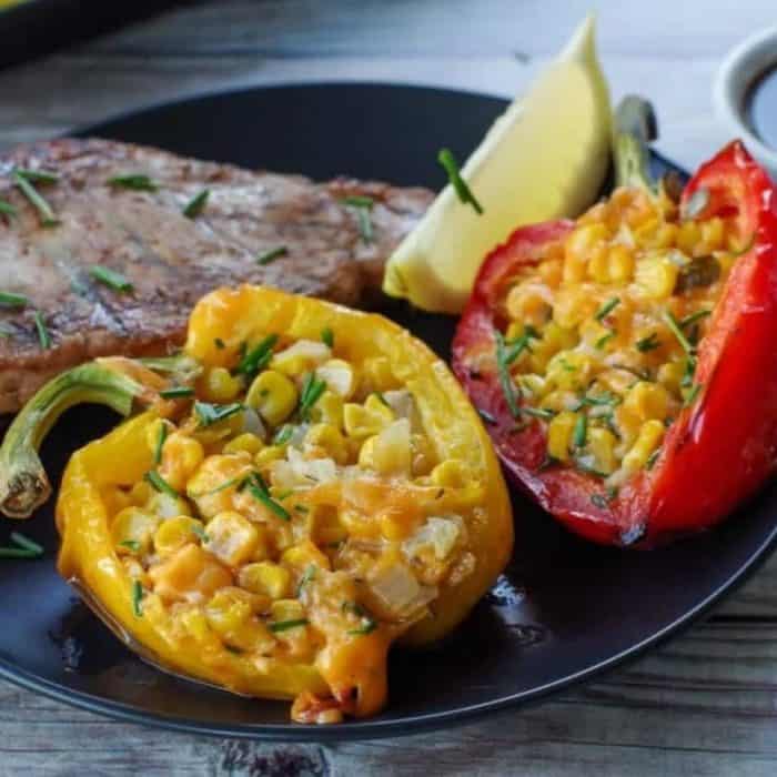 Nothing makes a steak more enjoyable than charred bell peppers. And these ones come stuffed with a sweet and savory corn filling that makes them even tastier!