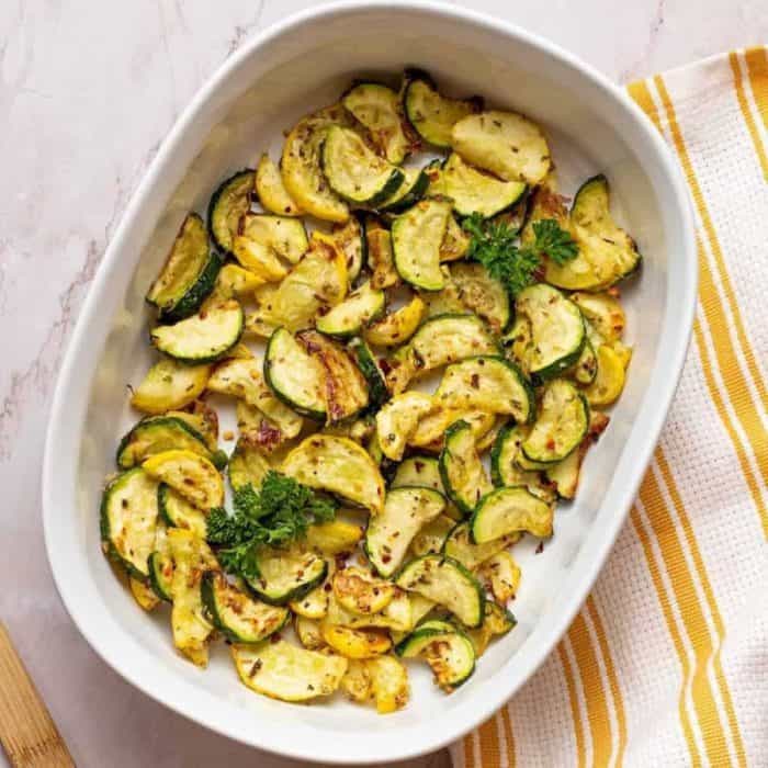 Seasoned with a blend of herbs and lightly coated in Parmesan, this combo of yellow squash and zucchini squash is air-fried to achieve a delicate crispness.