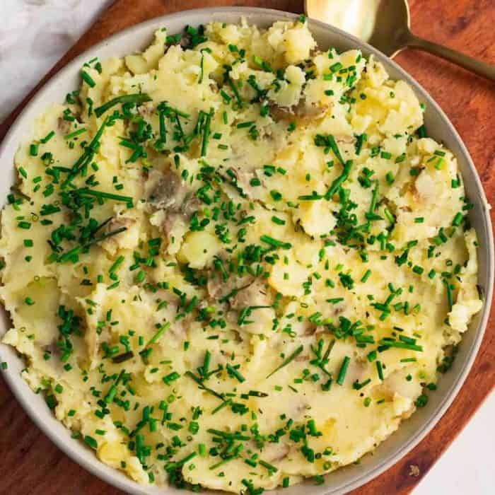 This cheese adds a subtle tanginess and extra creaminess, and it also helps reduce the carb content of the potatoes for a leaner take on the classic steak side.