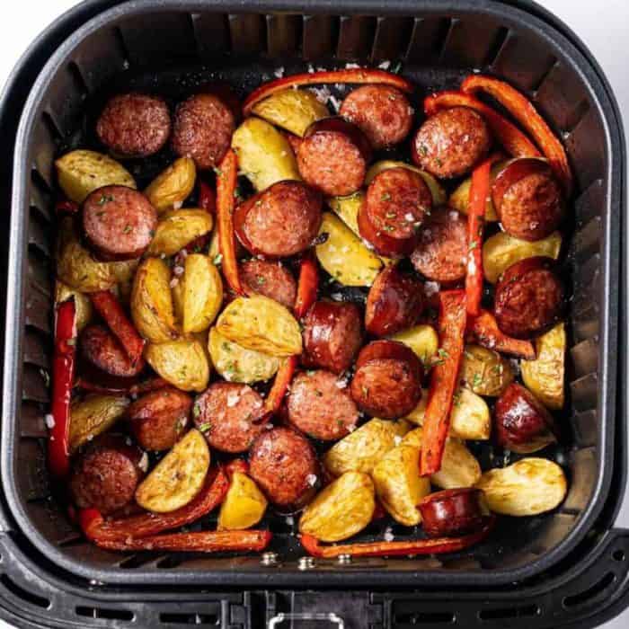 This air fryer kielbasa recipe with potatoes and peppers is done in 15 minutes with just four ingredients, is tasty, and partners well with bread, rice, or other dishes.