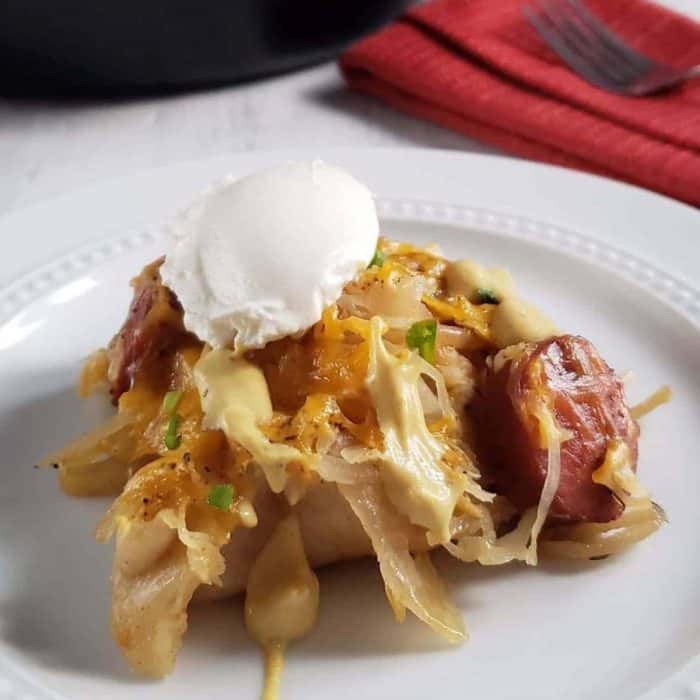 This recipe brings together soft, tender pierogies with crispy kielbasa, sweet caramelized onions, and tangy sauerkraut for a delightful combination of flavors and textures.