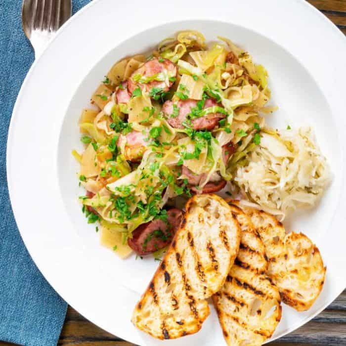 Lazanki is a delightful and uncomplicated Polish dish featuring cabbage, noodles, and kielbasa smoked sausage.