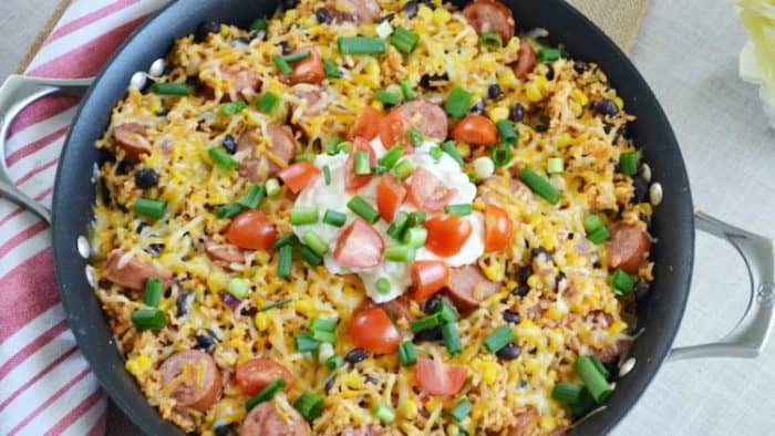 Sausage is the star, and its complemented with long grain rice, black beans, cheese, and tomatoes with delectable seasoning.