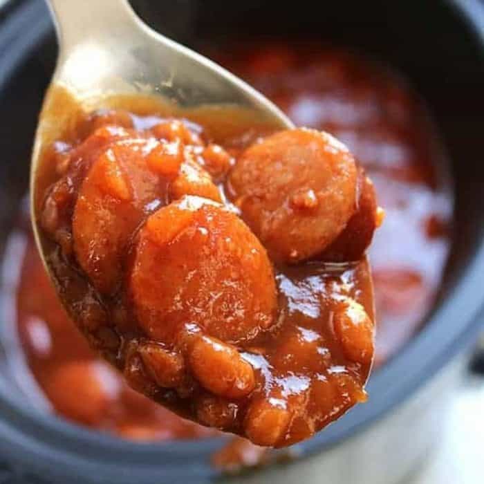 This Slow Cooker Barbecue Kielbasa and Beans is an ideal choice for your next potluck or summer BBQ.