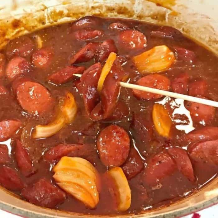 Tender onions and smoky, beefy kielbasa simmered in a rich, tangy barbecue sauce make for a dish that's perfect for serving straight out of the pot.