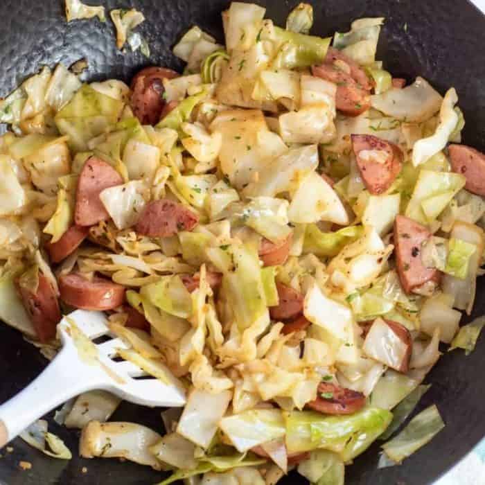This easy and satisfying kielbasa and cabbage skillet meal is a hearty one-pan dish with Eastern European flair.
