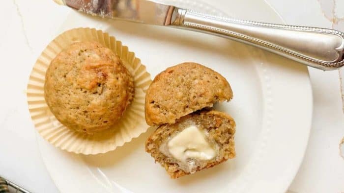 freshly baked cupcakes in a white plate made of ideal blend of ripe bananas and tangy sourdough discard