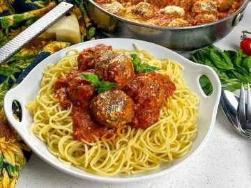 this spaghetti and meatballs recipe — a classic comfort dish that's been elevated with fresh herbs and a blend of beef and pork for the ultimate flavor.