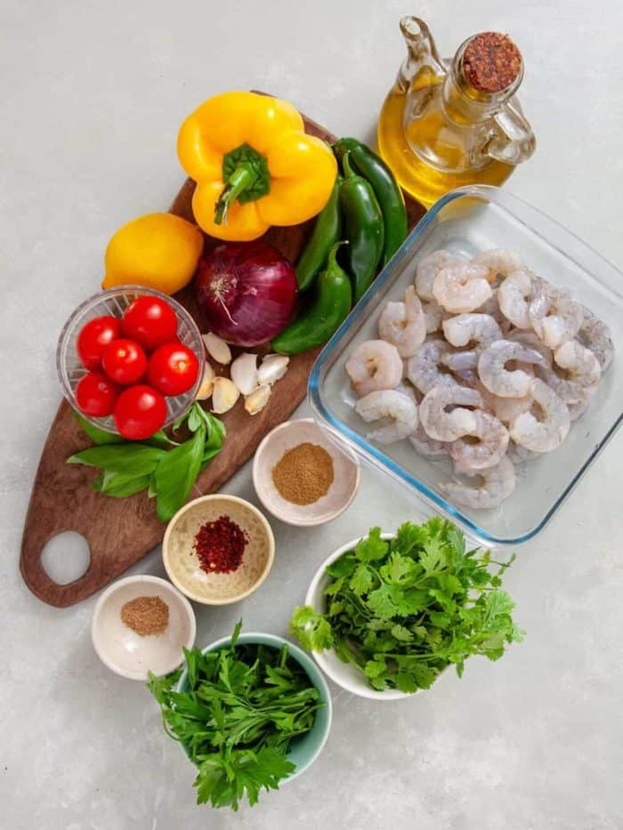 Our spicy grilled shrimp recipe starts with the freshest ingredients. This recipe consists of three key components: the shrimp skewers, the marinade, and the zhoug sauce.