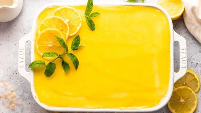 Layers of lemon syrup-soaked ladyfingers, creamy mascarpone, and a zesty lemon curd give you a blend of light and tangy flavors, offering a zesty alternative to the traditional coffee-infused tiramisu