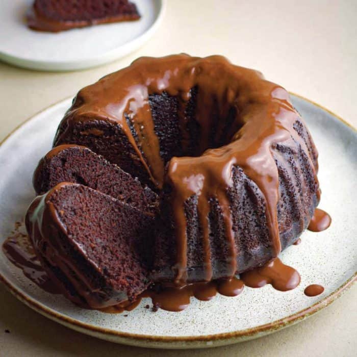 Baked in a Bundt pan, this chocolate cake not only tastes rich and delicious but also presents beautifully with its distinctive ring shape, which makes it a perfect centerpiece for your gatherings. 