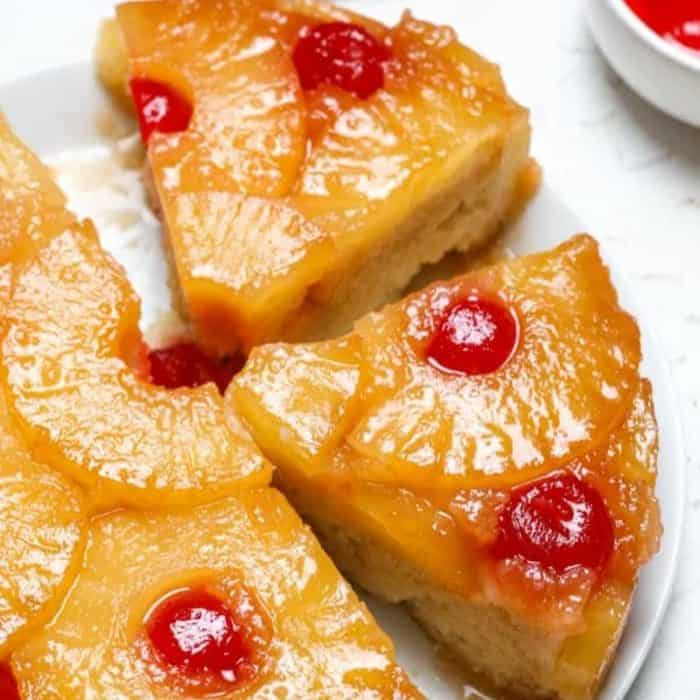 Here, cherries and pineapple rings caramelized to perfection sit atop a fluffy, golden cake that's delightfully sweet with a touch of tartness. 