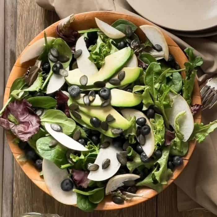 Textures and tastes collide in this avocado apple pear salad, where the creamy richness of avocado pairs effortlessly with the crispness of apples and the subtle sweetness of pears.