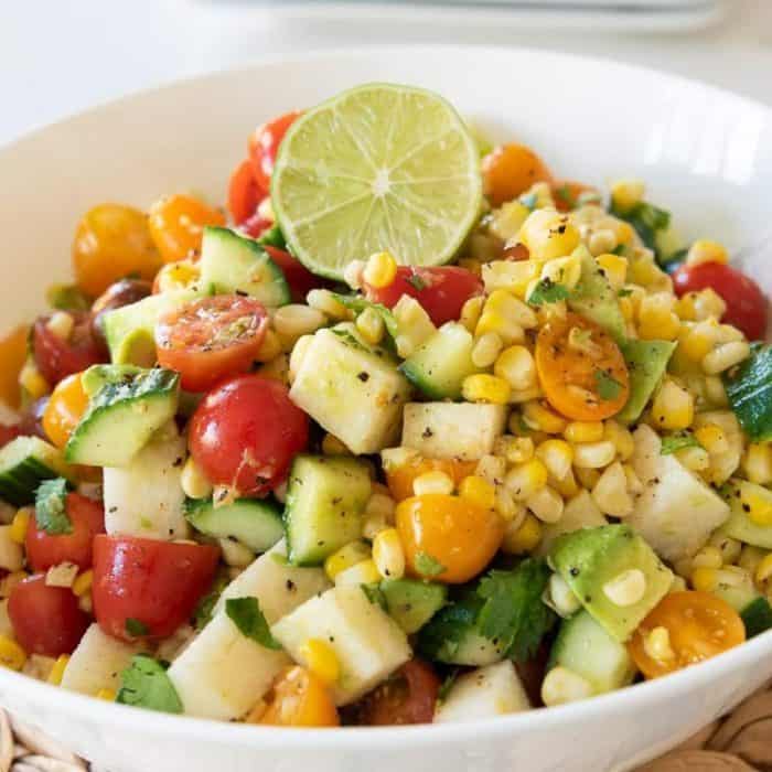 Other veggies like cherry tomatoes, English cucumber, and jicama elevate the dish’s texture, while the zingy lime vinaigrette makes it perfect to serve as a bright, palate-cleansing side for vegan tacos, rice dishes, and any other heavy meal.