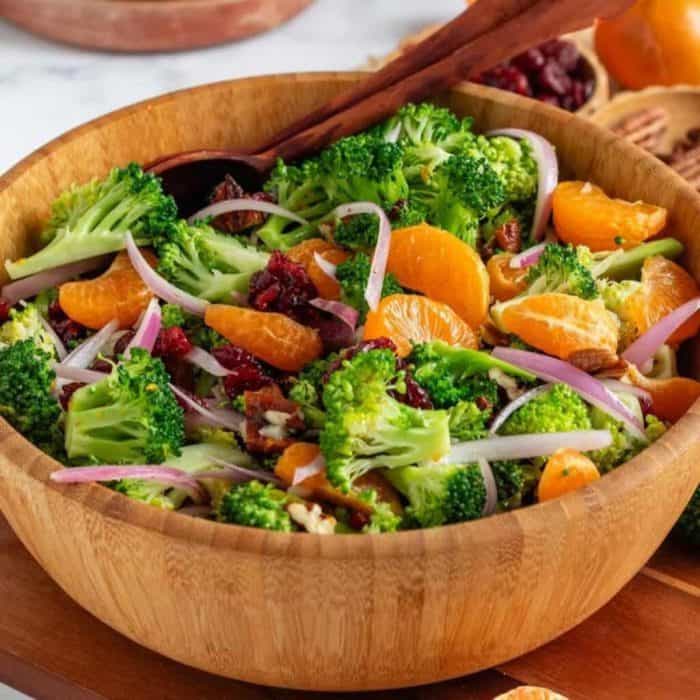 medley of textures with fresh broccoli florets, juicy Mandarin orange slices, toasted nuts, and chewy dried cranberries shine with the zingy ginger-orange dressing
