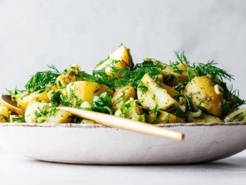 Rustic and comforting, this potato salad gives you all the familiar flavors of the classic recipe, including fork-tender potatoes and a lively dressing made with Dijon mustard, vegan mayo, preserved lemons, and apple cider vinegar.