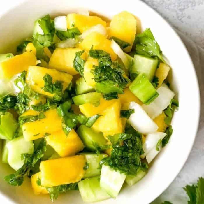 This simple yet exciting vegan salad is enlivened with a zingy mint-infused dressing, offering an escape to a culinary paradise where the flavors are bright and the essence of summer lingers with every bite.
