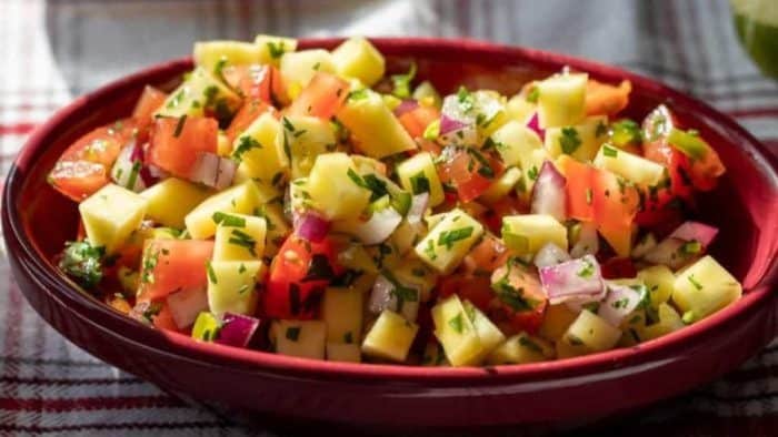 A popular take on the classic Mexican salsa, it brings together succulent mangoes with the classic components of tomatoes, onions, jalapeños, lime juice, and a sprinkle of cilantro.