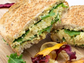 a photo of no egg sandwich on a chopping board