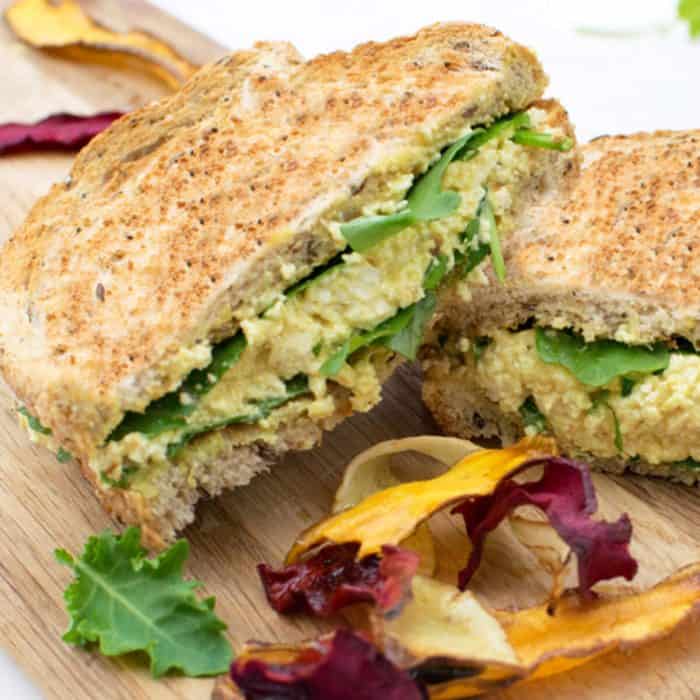 a photo of no egg sandwich on a chopping board