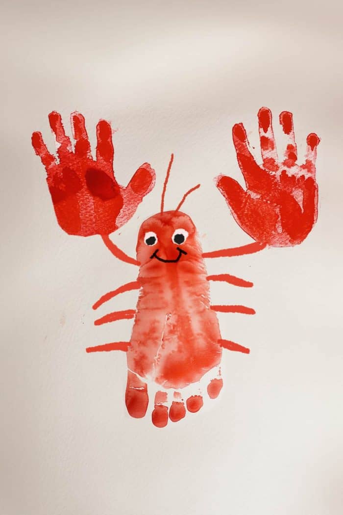 Dive into some ocean-themed fun by creating an adorable lobster painting. Start by using a footprint for the lobster's body, then add handprints on either side for the claws. Once everything is dry, use a brush or markers to add eyes and other details. 