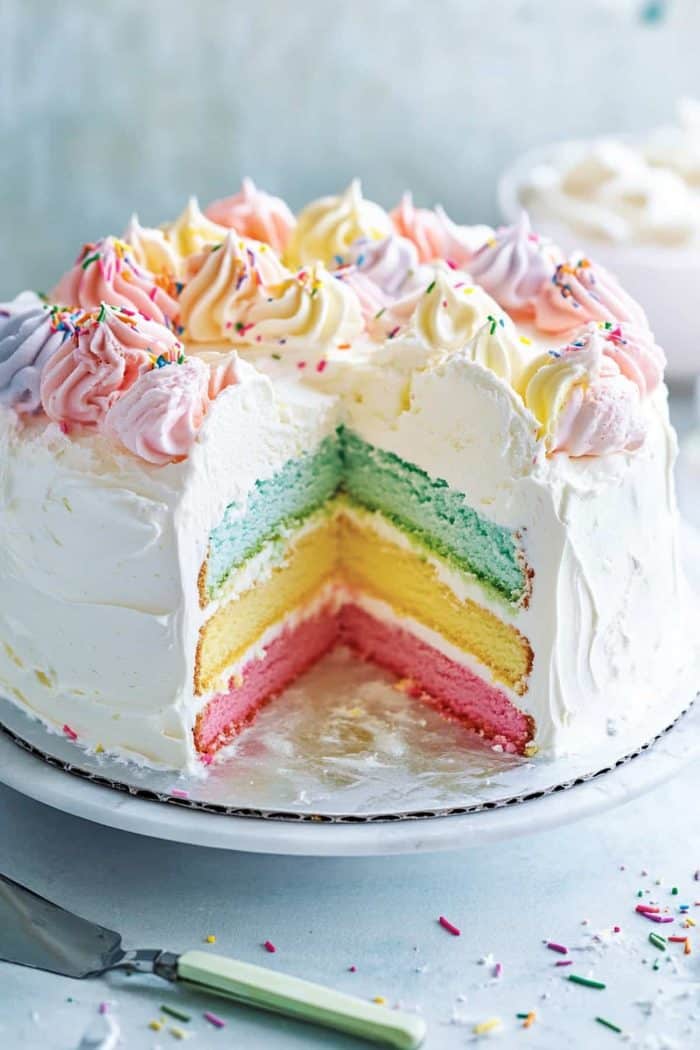 Bring a refreshing twist to your dessert table with a rainbow ice cream cake. This cool, creamy treat reveals colorful cake layers in every slice. Perfect for summer parties and afternoon gatherings!