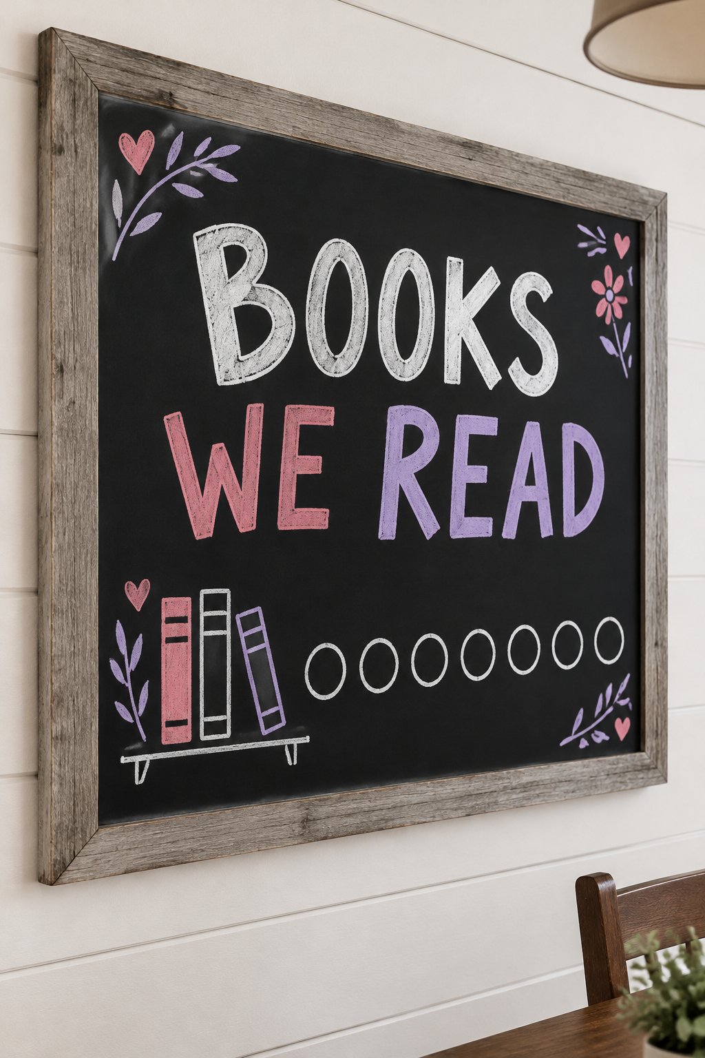 Books We Read: a hand-drawn valentines chalkboard sign reading "BOOKS WE READ".